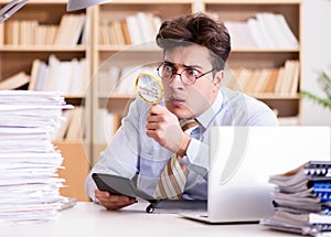 Mad auditor looking for errors in the report