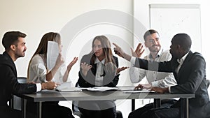 Mad diverse employees dispute at office meeting