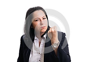 Mad female entrepreneur showing fist as angry gesture