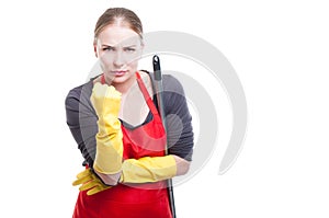 Mad or furious housekeeper showing her fist