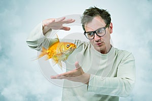 Mad Professor in smoke and goldfish, art concept of science