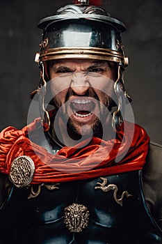 Mad roman warrior with dark armour screaming