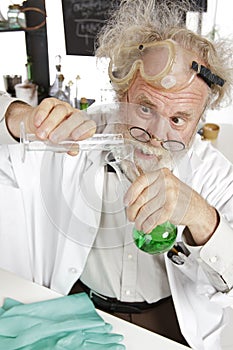 Mad scientist conducts chemistry experiment