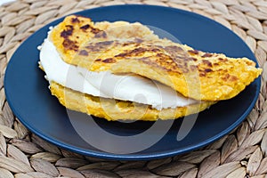 Cachapas on a rustic background. Close-up of Cachapa, a traditional food from Venezuela, Costa Rica and Colombia photo