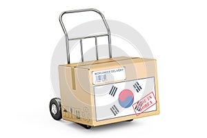 Made in South Korea concept. Cardboard Box on Hand Truck, 3D rendering