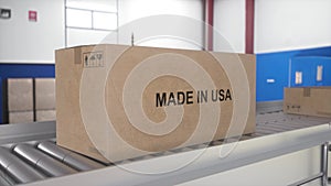 Made in USA import and export concept. Cardboard boxes with product from America on the roller conveyor