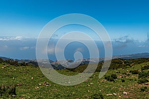 Madeira coastline near Calheta from viewpoint near Estrada Regional 105 road above Rabacal photo