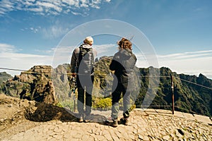 Madeira, Portugal - 2024.07.04: People hinking from Pico do Arieiro mountain to Pico Ruivo photo