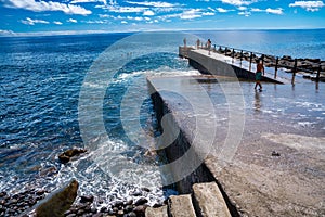 Madeira, Portugal - September 3, 2022: Jardim do Mar beach in Funchal with tourists