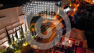 Madeira, Portugal - September 2, 2022: Aerial view of city center and buildings at night