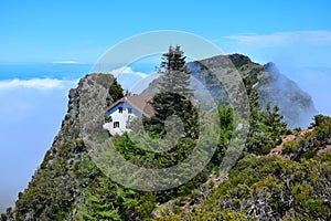 Madeiran landscape with high mountains and Casa de Abrigo. Portugal photo