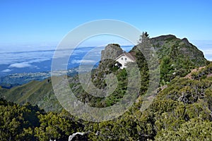 Madeiran landscape with high mountains and Casa de Abrigo. Portugal photo