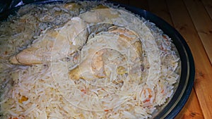 Madghout is a dish consisting of rice, chicken or meat, photo