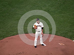 Madison Bumgarner stands on mound looking