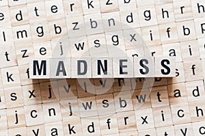 Madness word concept on cubes