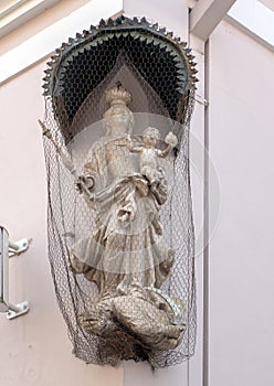 Madonna with crown holding infant Jesus who holds a globus cruciger, Krems, Austria