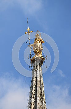 Madonnina gold statue in Milan