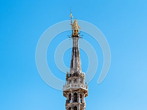 The Madonnina statue on top of Milan Cathedral