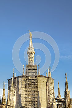 The Madonnina is a statue of the Virgin Mary atop Milan Cathedral
