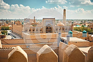 Madrasah and Kalta Minor minaret in ancient city at Khiva in Uzbekistan