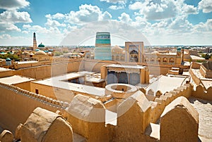 Madrasah and Kalta Minor minaret in ancient city at Khiva in Uzbekistan photo