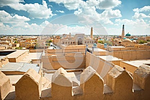 Madrasah and Kalta Minor minaret in ancient city at Khiva in Uzbekistan photo