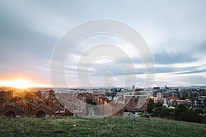 Madrid cityscape at sunset with purple clouds