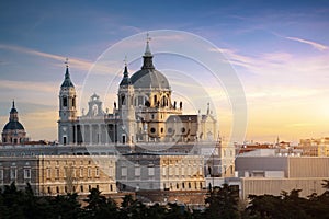 Madrid landmark at night. Landscape of Santa Maria la Real de La Almudena Cathedral and the Royal Palace. Beautiful skyline at