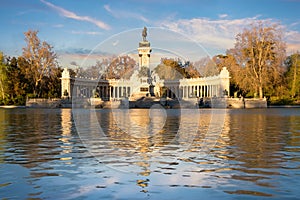 Madrid landmark. Sunset time at the memorial in Retiro city park, Madrid, Spain. Beautiful sky during summer sunset