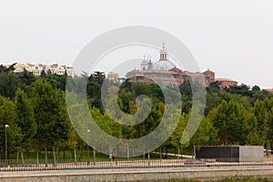 Madrid Rio park with San Francisco el Grande church on background photo