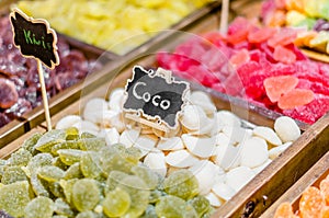 Sweets stand exposing colorful comfit in a market