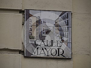 MADRID, SPAIN - DECEMBER 14, 2022: Street name calle mayor sign on in Madrid, capital of Spain renowned for its rich repositories photo