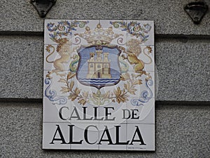 MADRID, SPAIN - DECEMBER 14, 2022: Street name calle de alcala sign on in Madrid, capital of Spain renowned for its rich photo