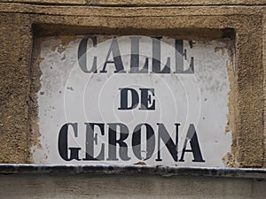 MADRID, SPAIN - DECEMBER 14, 2022: Street name calle de gerona sign on in Madrid, capital of Spain renowned for its rich photo