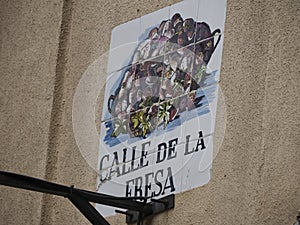 MADRID, SPAIN - DECEMBER 14, 2022: Street name calle de la fresa strawberry street sign on in Madrid, capital of Spain renowned photo