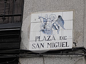 MADRID, SPAIN - DECEMBER 14, 2022: Street name plaza de san miguel sign on in Madrid, capital of Spain renowned for its rich photo