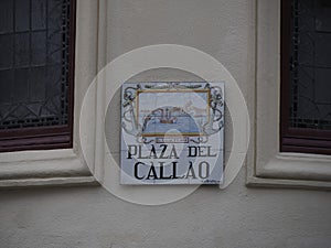 MADRID, SPAIN - DECEMBER 14, 2022: Street plaza del callao name sign on in Madrid, capital of Spain renowned for its rich photo