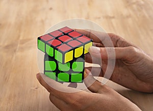 Madrid, Spain; 06 february 2019: Rubik Cube puzzle intelligence toy game solved, three sides