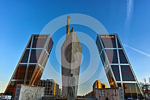 Gate of Europe KIO Towers and Obelisk of Calatrava at Paseo de la Castellana street in City of Madrid, Spain