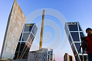 Gate of Europe KIO Towers and Obelisk of Calatrava at Paseo de la Castellana street in City of Madrid, Spain