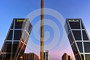 Gate of Europe KIO Towers and Obelisk of Calatrava at Paseo de la Castellana street in City of Madrid, Spain