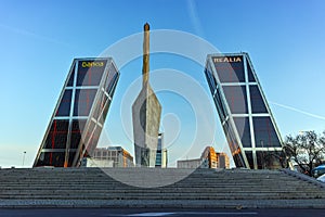 Gate of Europe KIO Towers and Obelisk of Calatrava at Paseo de la Castellana street in City of Madrid, Spain