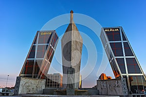 Gate of Europe KIO Towers and Obelisk of Calatrava at Paseo de la Castellana street in City of Madrid, Spain