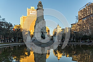 Sunset view of Monument to Cervantes and Don Quixote and Sancho Panza at Spain Square in City o