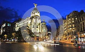 Gran VÃÂ­a illuminated at dusk, an upscale shopping street located in central Madrid