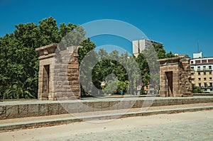 The stone temple of Debod on a wooden garden in Madrid