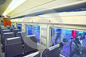 Interior of modern hi-speed passenger train of Spanish railways photo