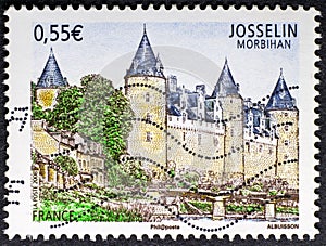 Josselin castle in vintage french stamp