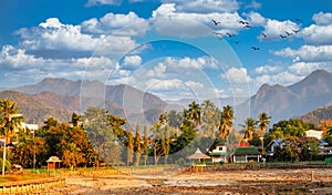 Mae Hong Son city with mountains in background