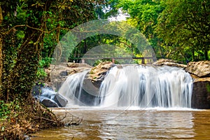 Mae sa waterfall near Chiang Mai city, Thailand. Flowing water in tropical rainforest